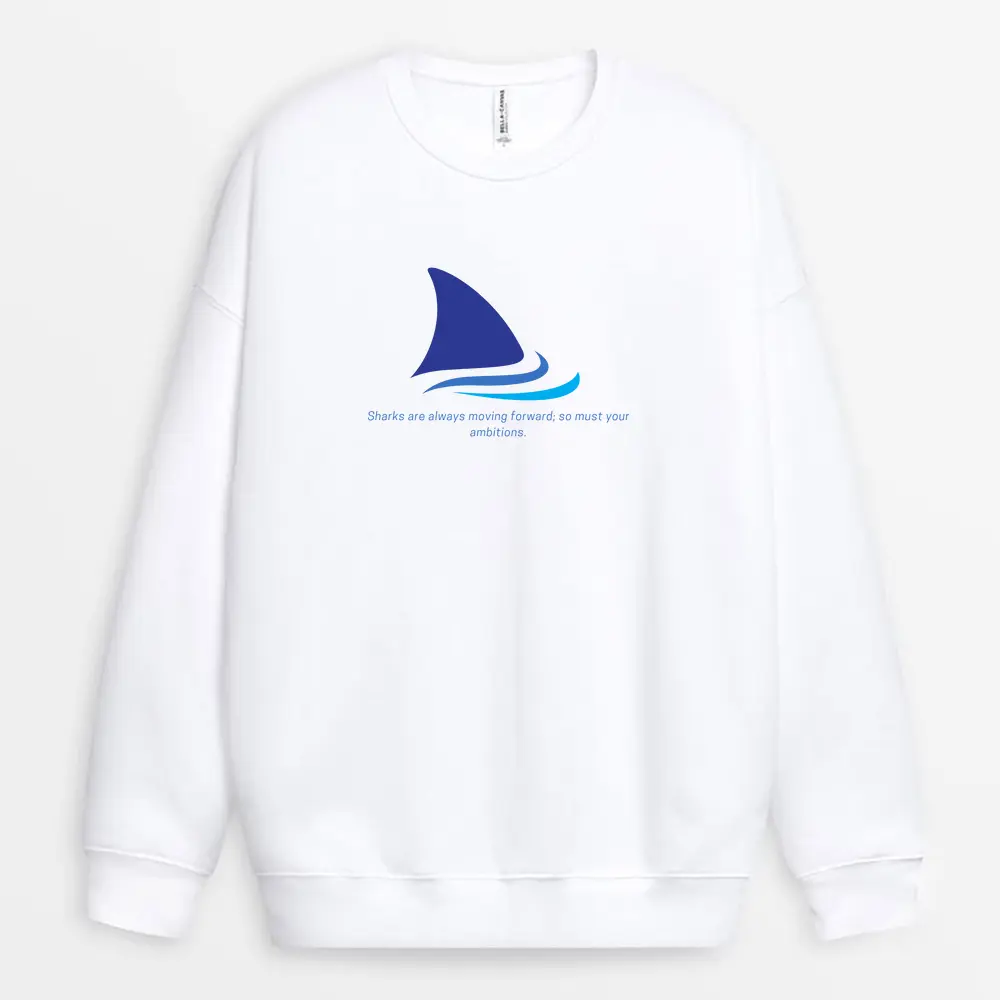 White sweatshirt featuring a swimming shark – move with ambition graphic design